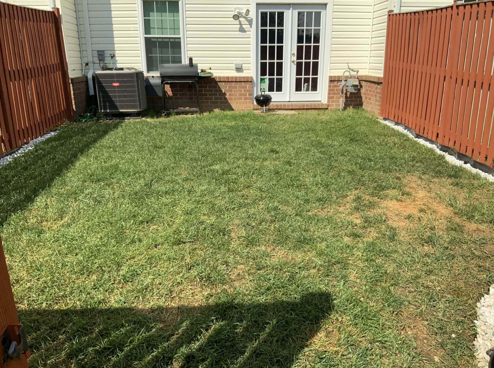 Before townhouse backyard patio